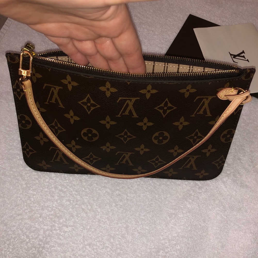 Louis Vuitton pouch wristlet in Monogram!